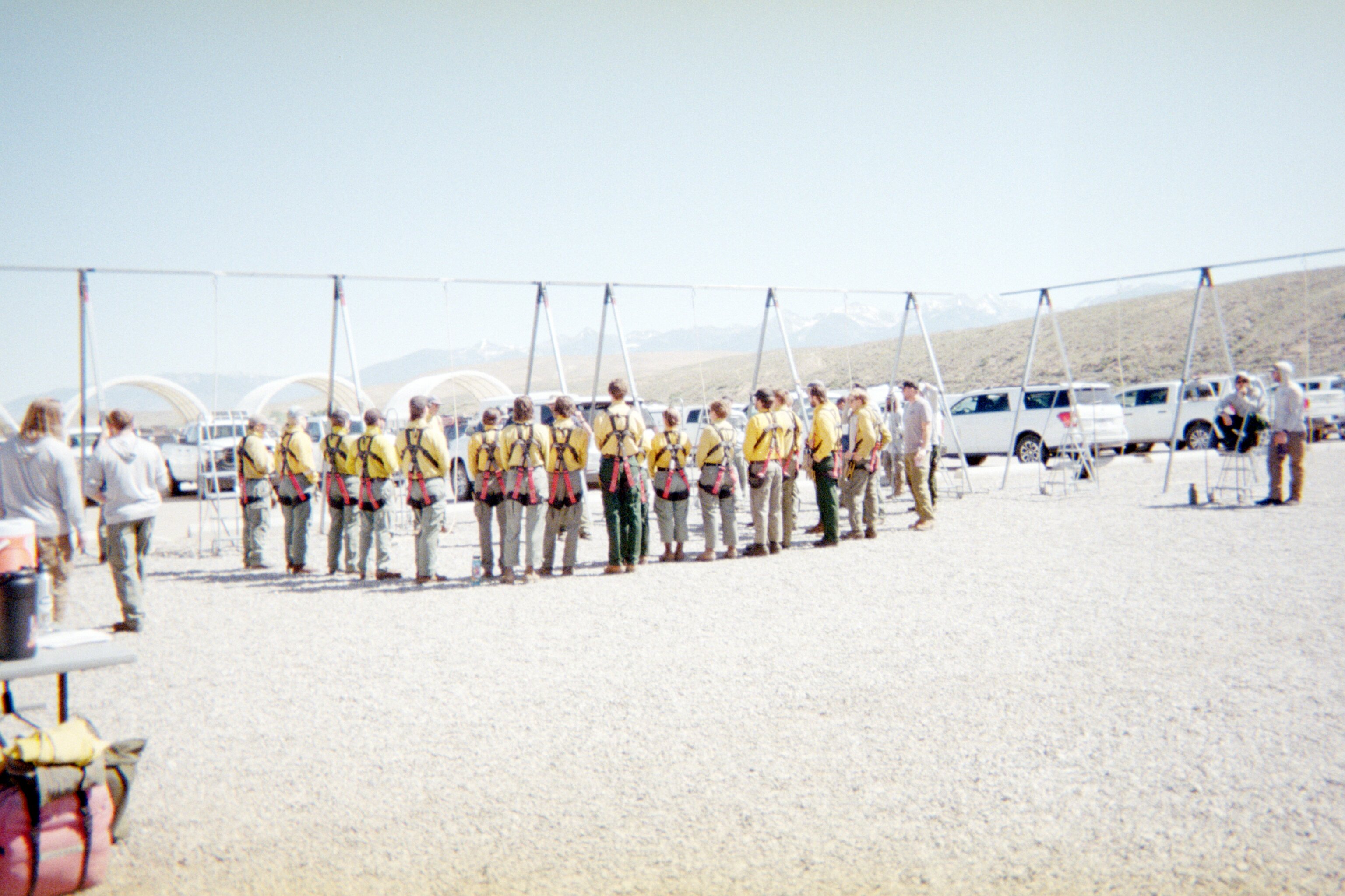 Rookie rappellers begin ground training at the National Rappel Academy in Salmon, Idaho, learning the standardized skills and equipment used in USFS helicopter rappel operations.